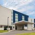 SpringHill Suites by Marriott Beaufort exterior with modern blue-and-white facade and covered entrance