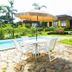 Pousada Paço do Lavradio in São João del Rei with poolside patio, umbrella table and lounge chairs