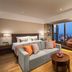 Somerset Xindicheng Xi'an room with sofa, desk and city-view window in Xi'an