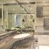 Parkhotel Oberhausen bathroom with granite vanity, sink, mirror, heated towel rail and glass shower