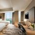 DoubleTree by Hilton Hotel Jakarta - Diponegoro twin bedroom with city view and desk in Jakarta