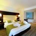 Hotel Charleroi Airport - Van Der Valk room with king bed and freestanding bathtub in Charleroi