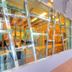 One One Bangkok Hotel lobby entrance with modern glass walls and warm lighting in Bangkok