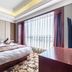 Hangzhou Sailing International Hotel room with king bed and floor-to-ceiling window in Hangzhou