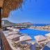 Samira Resort Hotel Aparts & Villas in Kalkan with a large outdoor pool, sun loungers, and sea views