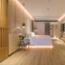 Puruihotel Yongkang in Jinhua: modern guest room with king bed, wall-mounted TV, and wood floors
