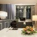 Hotel Pharos Seoul lobby with floral arrangement, seating area, desk and tall lamps
