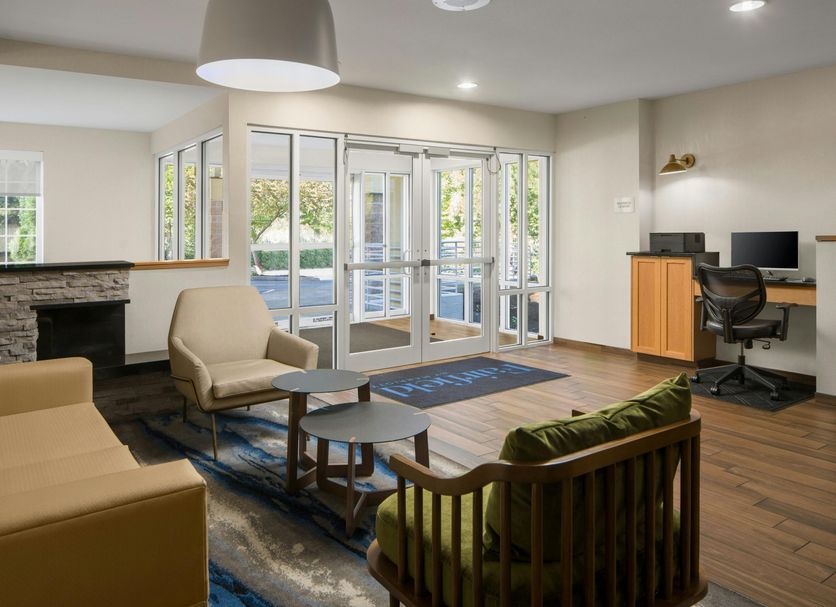 Fairfield by Marriott Inn & Suites Portland West/Beaverton lobby seating area with glass entry doors in Beaverton