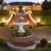 La Plume Boutique Hotel & Spa in Oudtshoorn: evening view of fountain and lit front steps