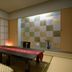 Ryokan Kohro in Kyoto: tatami room with low table, shoji screens and checkered accent wall