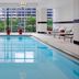 Indoor pool at Home2 Suites by Hilton Chicago McCormick Place in Chicago with large windows