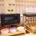 Onyado Nono Asakusa Bettei breakfast buffet in Tokyo with toaster, bowls, rolls and plates