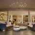 The Bannister Hotel in Samaná lobby lounge with sofas, ottomans, and soft ceiling lights