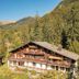 Grindelwald Youth Hostel in Grindelwald with chalet exterior and mountain forest views