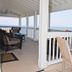 Desoto Beach Terraces, Tybee Island: oceanfront balcony with rocking chairs and beach view