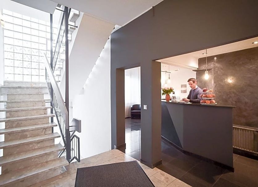 Hotel Mautner Airport und Messehotel Stuttgart lobby with staircase and reception desk