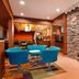 Fairfield Inn & Suites by Marriott Corpus Christi lobby with stone fireplace and blue chairs