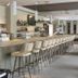 Grand Prix Hôtel & Restaurant in Le Castellet bar with long counter and row of stools