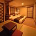 Dormy Inn Premium Otaru Natural Hot Spring guest room in Otaru with twin beds and tatami seating