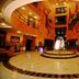 Hotel Devi Grand, Katra: grand atrium lobby with central fountain and curved balconies