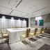Naspa New Otani in Yuzawa meeting room with long white conference table and gold chairs