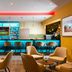 Leonardo Hotel Offenbach Frankfurt lounge with illuminated bar and seating in Offenbach am Main