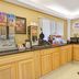Super 8 by Wyndham Jacksonville Orange Park breakfast area with cereal dispensers and beverage station