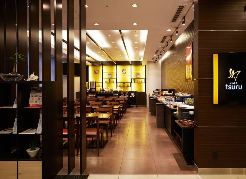 S Peria Hotel Nagasaki restaurant with dining tables, buffet counter, and warm lighting