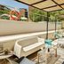 Sercotel Madrid Aeropuerto in Madrid: outdoor terrace with pergolas, seating, and lounge chairs