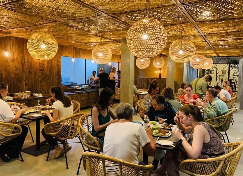 88th - Ella restaurant in Ella with guests dining under woven hanging lights and bamboo decor