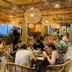 88th - Ella restaurant in Ella with guests dining under woven hanging lights and bamboo decor