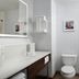Hampton Inn & Suites Arroyo Grande/Pismo Beach Area bathroom with vanity, toilet and shower