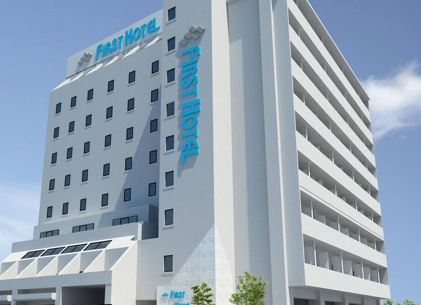 Kansai Airport First Hotel in Izumisano, exterior of modern white high-rise hotel