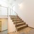 Osrodek Wypoczynkowy Wiga in Kolobrzeg: bright stairwell with carpeted stairs and glass railing
