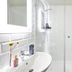 Living Hotel am Olympiapark in Munich bathroom with glass shower and white sink