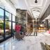 Grand Uysal Apart Hotel in Alanya lobby with marble floors, chandeliers, and red seating area