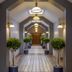 Glenroyal Hotel & Leisure Club in Maynooth corridor with pendant lights and potted topiary