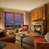 Faraway Jackson Hole living room with fireplace and mountain view in Teton Village