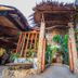 Bamboo Bungalow Resthouse Boracay entrance with bamboo gate and lush tropical plants in Boracay