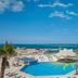 Hilton Hurghada Plaza in Hurghada with a lagoon-style pool, palm trees, and Red Sea views