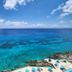 Coral Princess Hotel & Dive Resort in Cozumel overlooking turquoise Caribbean water and rocky shoreline