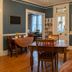 5 Ojo Inn Bed & Breakfast in Eureka Springs: bright dining room with wooden tables and chairs