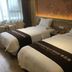 Anyi 158 Hotel Renming Park Chengdu room with two twin beds beside a window