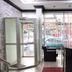 Talaslioglu Hotel lobby in Kayseri with front desk, seating area, and street-facing glass entrance