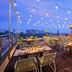 Aloft Bengaluru Outer Ring Road rooftop terrace dining with string lights and city views in Bengaluru