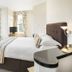 Hawksmoor Guest House, Windermere bedroom with king bed, window seating and large windows