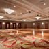 Best Western Plus Cobourg Inn & Convention Centre ballroom with polished wood floor and chandeliers in Cobourg