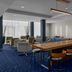 Courtyard by Marriott Pittsburgh Airport Settlers Ridge lobby lounge with communal table and seating in Pittsburgh