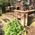Robeanne House in Beverley with a wooden cabin deck, outdoor seating, and flowered garden