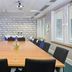 Kents Hill Park Training & Conference Centre in Milton Keynes meeting room with long conference table and projector